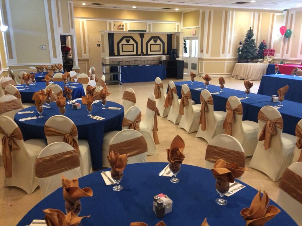 Wide view of the banquet hall set for an event